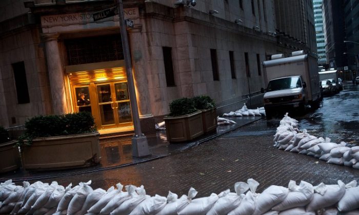 The New York Stock Exchange is seen surrounded with sand bags on Monday Oct. 29 in New York City. U.S. equity markets were mostly closed on Monday due to effects of Hurricane Sandy. (Andrew Burton/Getty Images)