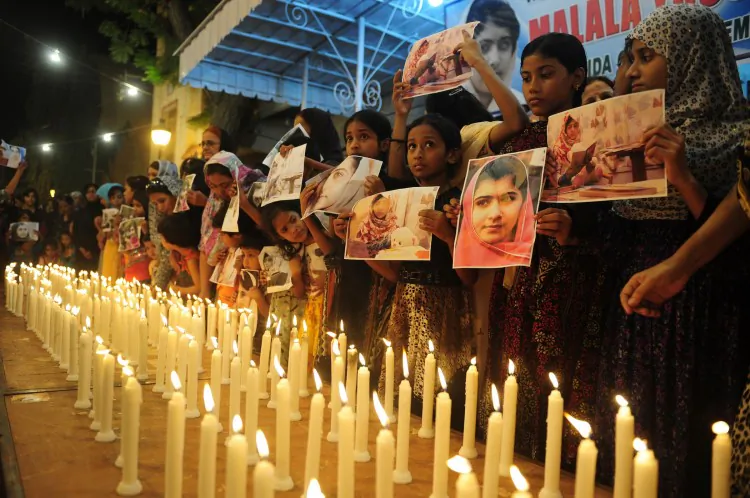 Pakistani students attend a ceremony to mark 'Malala Day' in Lahore on November 10, 2012. (Arif Ali/AFP/Getty Images)