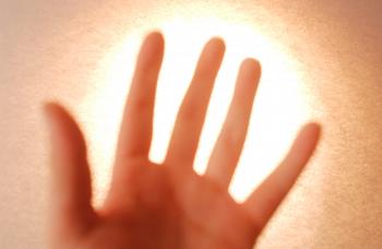 HEALTHY GLOW: Japanese scientists have discovered that the human body actually emits light. (photos.com)