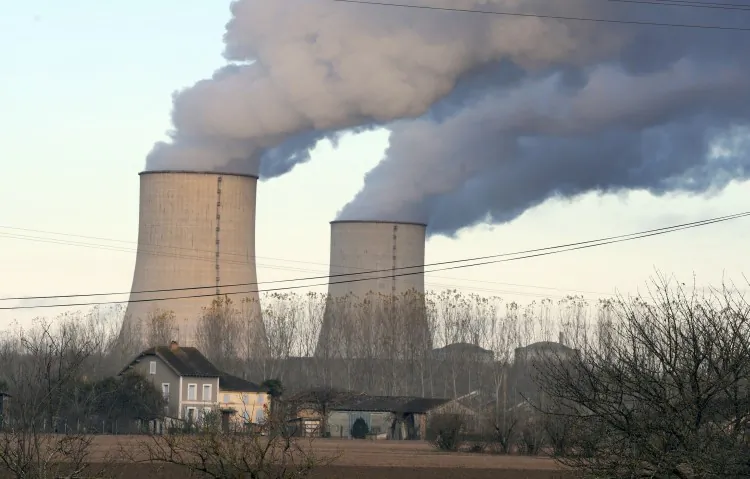 The two reactors' cooling towers are in action at the Golfech nuclear power plant in southwestern France on Nov. 27, 2012. (Eric Cabanis/AFP/Getty Images)