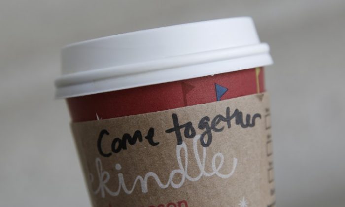 A cup of coffee with the words "come together" at the Union Station Starbucks on Dec. 27, 2012, in Washington, D.C. Starbucks CEO Howard Schultz said that the words are meant for lawmakers, referring to the divisive negotiations over the "fiscal cliff." (Drew Angerer/Getty Images)