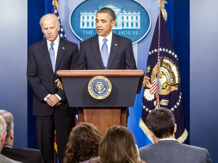 Vice President Joseph R. Biden (L) looks on as President Barack Obama makes a statement in the White House Briefing Room following passage by the House of tax legislation on January 1, 2013 in Washington, D.C. (Brendan Hoffman/Getty Images)