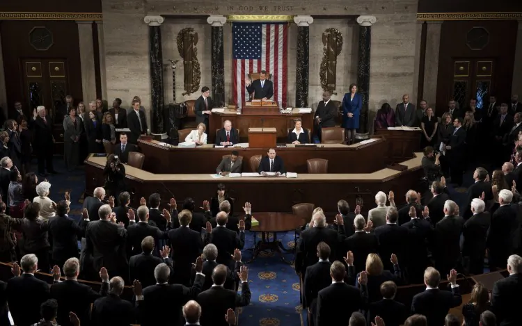 Speaker of the House John Boehner (R-Ohio) swears in members of the 113th US House of Representatives during the opening session at the U.S. Capitol in Washington, D.C., on Jan, 3, 2013. More women than ever before in American history took their oaths of office as members of the 113th Congress. (Saul Loeb/AFP/Getty Images)