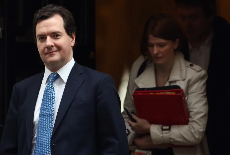 Chancellor George Osborne leaves 11 Downing Street on Jan. 7 in London, England. Osborne recently talked about the possibility of breaking up "too big to fail" banks during a crisis. (Dan Kitwood/Getty Images)