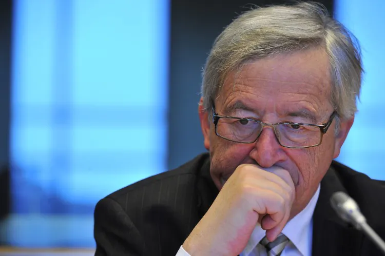 Eurogroup president Jean-Claude Juncker attends the commission meeting on "Economic and Monetary Affairs" of the European Parliament on Jan. 10 in Brussels. Juncker said earlier this month that the euro exchange rate is too high to sustain economic growth. (Georges Gobet/AFP/Getty Images)