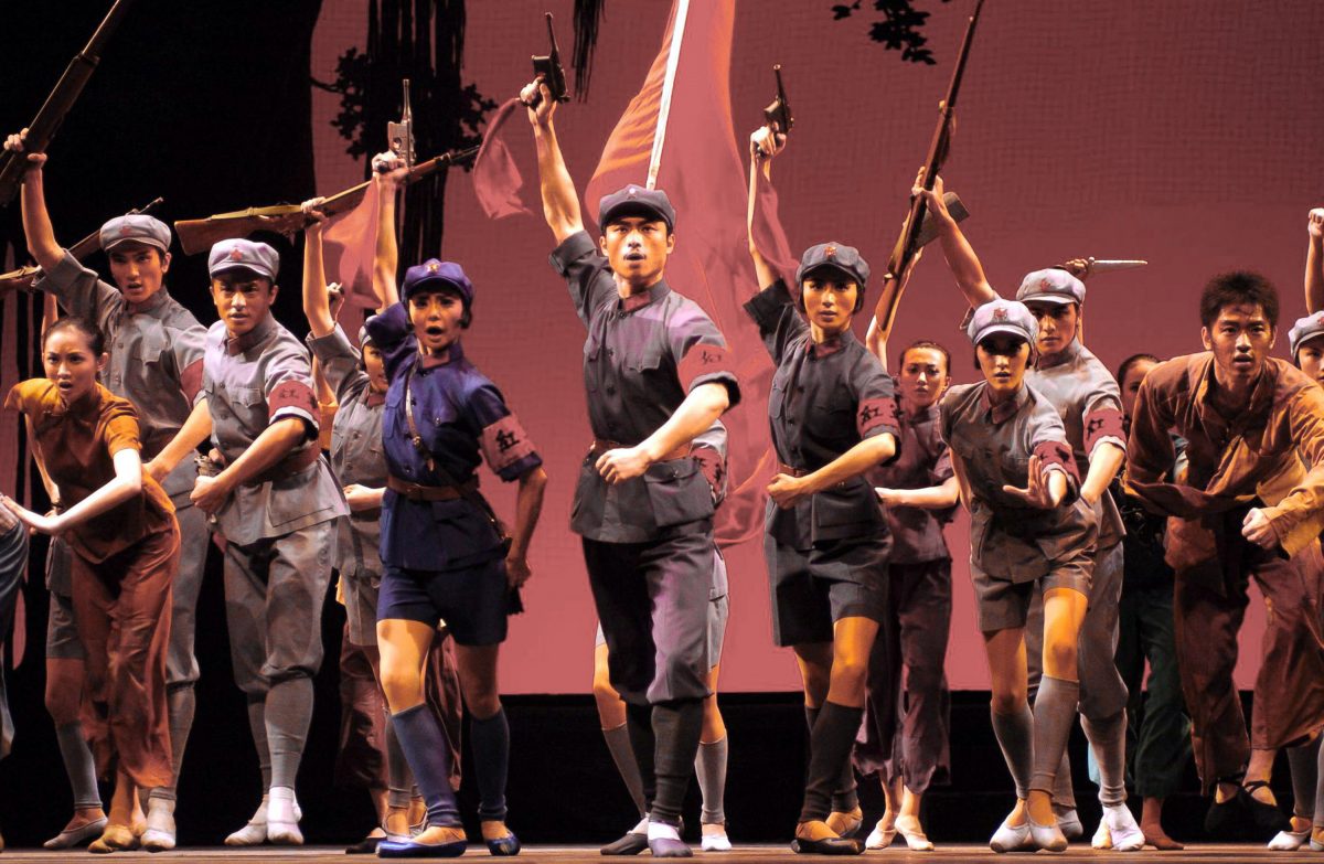 In this photo released by China's official Xinhua news agency, ballet dancers perform classic "red detachment of women" in Nanning, capital of southwest China's Guangxi Zhuang Autonomous Region, on Thursday November 9, 2006. Various activities were held this year to mark the 70th anniversary of the success of the "Long March," a strategic military manoeuvre by the Red Army from 1934 to 1936 in its fight with the Kuomintang army. (AP Photo/Xinhua Photo, Liu Guangming)