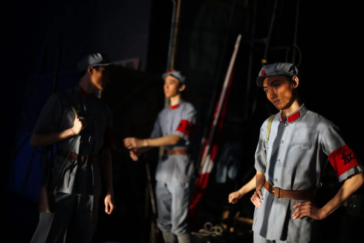 Dancers from National Ballet of China wait backstage for their turn to perform the Mao-era ballet  "The Red Detachment of Women" in Beijing, China, Wednesday, Dec. 16, 2009. (AP Photo/Elizabeth Dalziel)