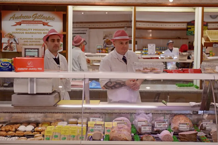 Butchers prepare for work at a butcher shop in Glasgow, Scotland, Feb. 12. British high street butchers are reporting a sharp increase in sales of freshly cut meat since the horsemeat food scandal broke. Tests on some of Canada’s most popular frozen and fast food hamburger patties did not find horsemeat. (Jeff J Mitchell/Getty Images)