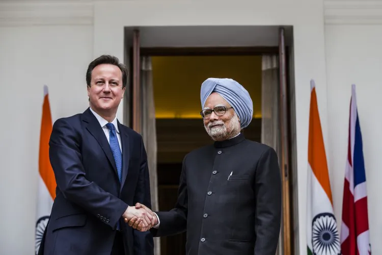 British Prime Minister David Cameron shakes hands with Indian Prime Minister Manmohan Singh at Hyderabad House on February 19, 2013 in New Delhi, India. (Daniel Berehulak/Getty Images)