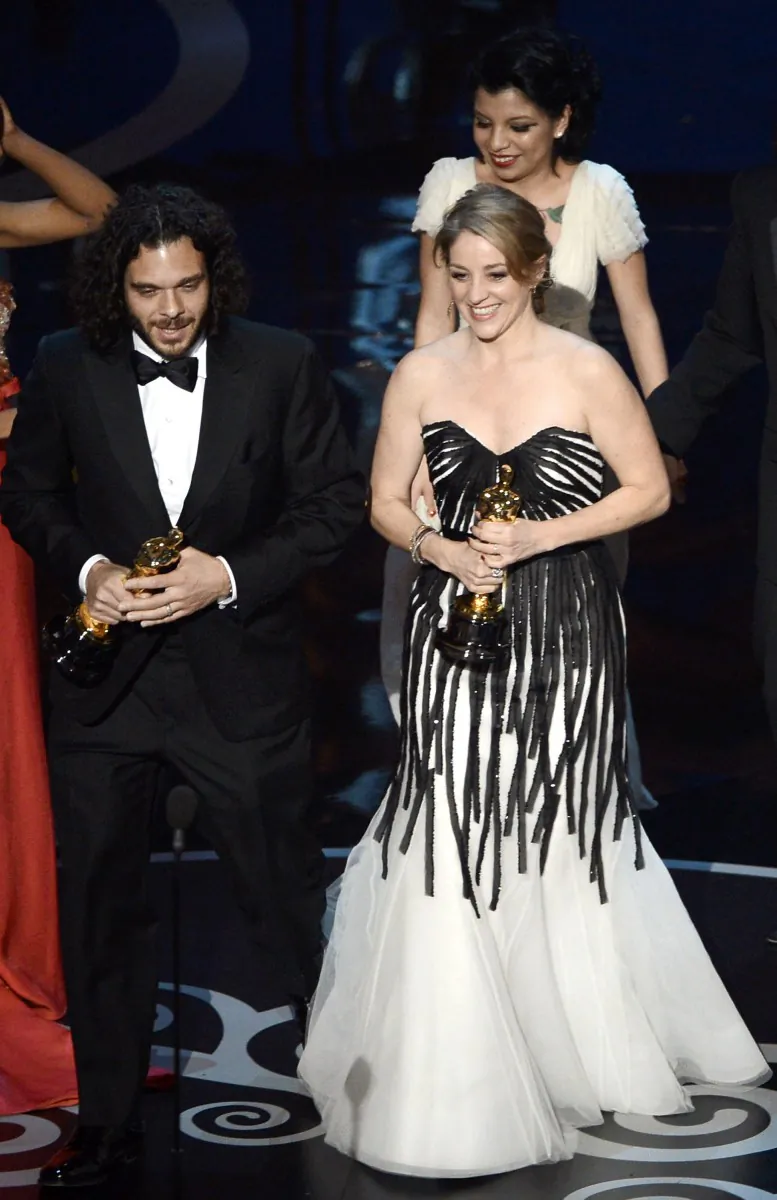 'Inocente' directors, Sean Fine and Andrea Nix Fine, win the Best Documentary Short Subject award for 'Inocente' during the Oscars. 'Inocente' is the first ever Kickstarter funded-film to win an Oscar. (Kevin Winter/Getty Images)