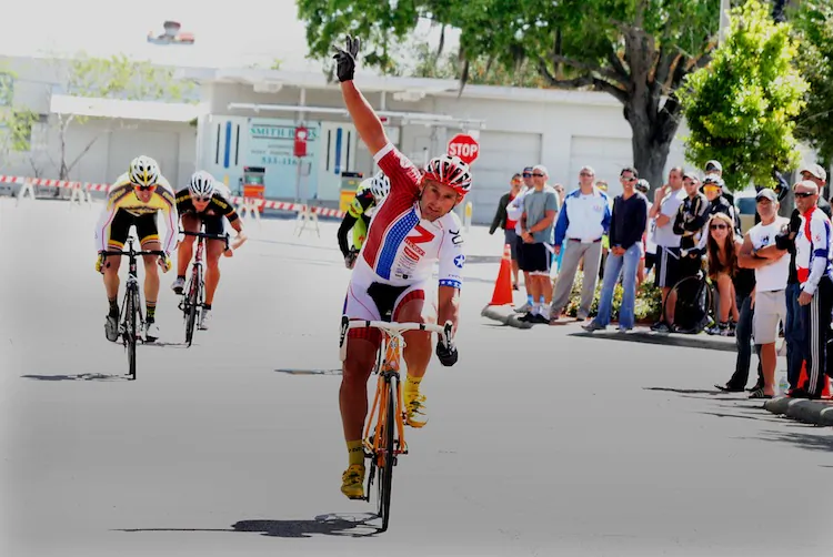 (R-L) Derek Bennett, Eric Stubbs, and Grant Potter escape from the peloton. (James Fish/The Epoch Times)