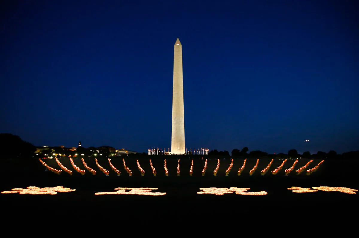 Around 12,000 candles were arranged for a vigil in Washington, D.C. on July 16, to mark the anniversary of the persecution of Falun Gong. (Lisa Fan/Epoch Times)