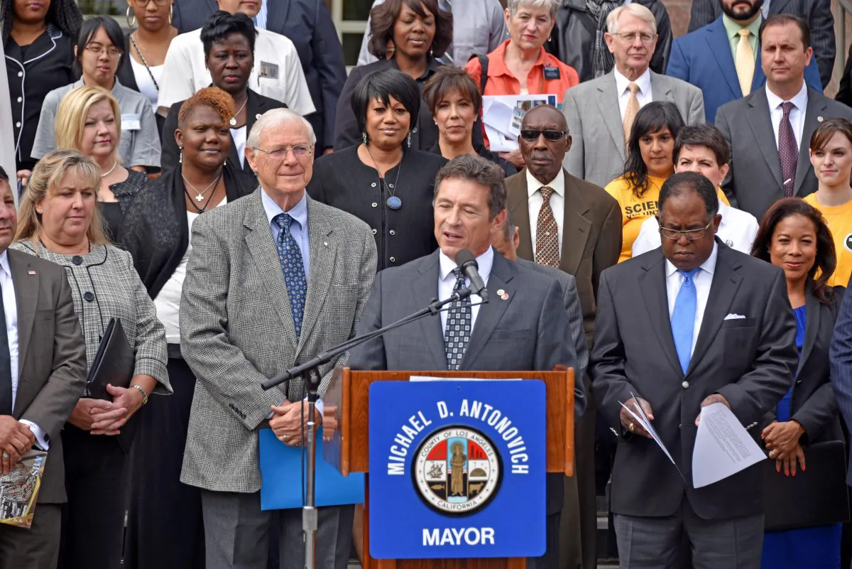 Los Angeles County Mayor Michael D. Antonovich (Center) with Jeff Reeb, L.A. County Office of Emergency Management (L), and Supervisor Mark Ridley-Thomas (R), joined by members of the clergy and faith-based organizations from around the county to announce the 2nd Annual “Los Angeles County Pledge to Prepare” campaign. (Robin Kemker/Epoch Times)