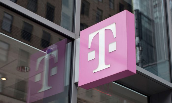 A T-Mobile store is seen at Seventh Avenue and 49th Street in Manhattan, March 23. On Wednesday, T-Mobile USA, announced an agreement to merge with MetroPCS Communications Inc., strengthening its no-contract, pay-as-you-go value offering. (Andrew Burton/Getty Images)