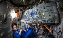 Space Station Astronauts Take Shelter From Space Junk