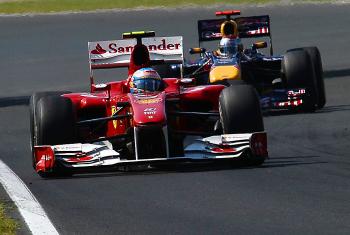 Red Bull's Sebastian Vettel (R) couldn't get past Ferrari's Fernando Alonso and had to settle for third. (Fred Dufour/AFP/Getty Images)