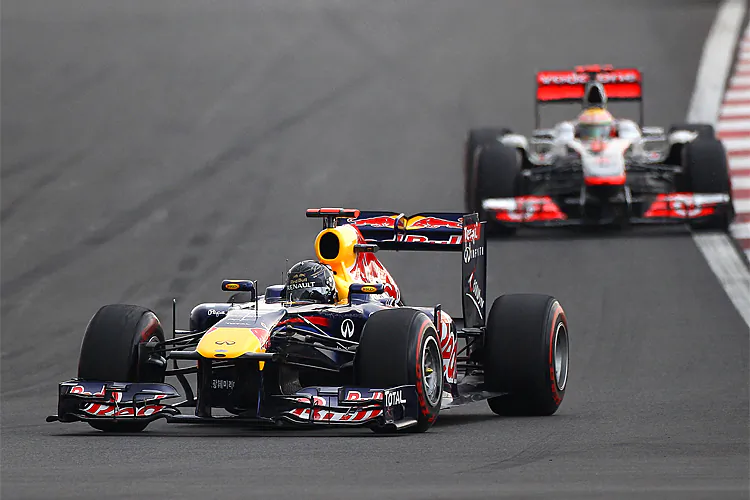 Sebastian Vettel leads Lewis Hamilton during the 2011 Formula One Korean Grand Prix. The Red Bull Driver hopes to repeat his 2011 victory. (Clive Mason/Getty Images)