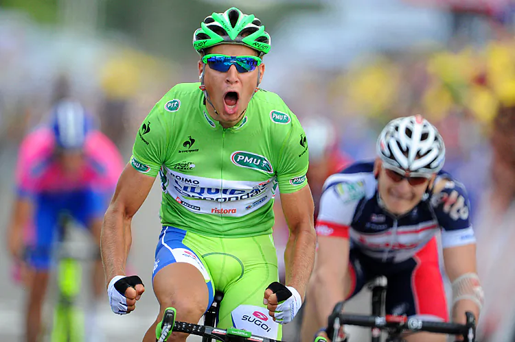 Peter Sagan (C) does his Incredible Hulk victory celebration as he edges André Greipel in Stage Three of the Tour de France. (Pascal Pavani/AFP/GettyImages)