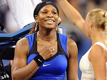 Serena Williams celebrates after beating Caroline Wozniacki in a Women's semifinal match at the US Open tennis tournament. (Henny Ray Abrams/AFP/Getty Images)