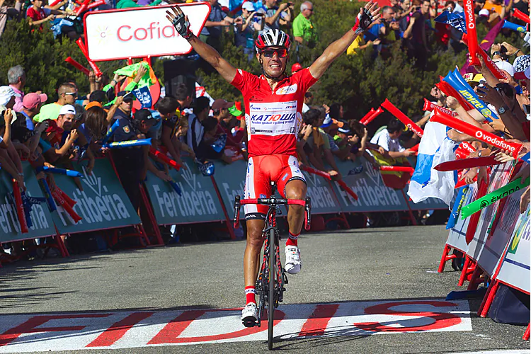 Alberto Contador of Saxo-Tinkoff crosses the finish line after not catching Joaquim Rodriguez in the final few hundred meters of Stage 14. (Jaime Reina/AFP/GettyImages)