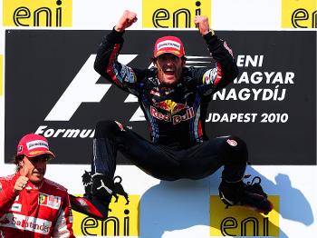 Red Bull's Mark Webber leaps into the air to celebrate winning the Formula 1 Hungarian Grand Prix, his fourth of the season. No other driver has more than two wins. (Clive Mason/Getty Images)