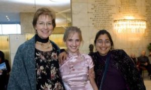 Young Western Girl Wears Beautiful Chinese Dress to Shen Yun