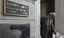Greek Banks Reopen but Cash Limits Remain and Taxes Soar