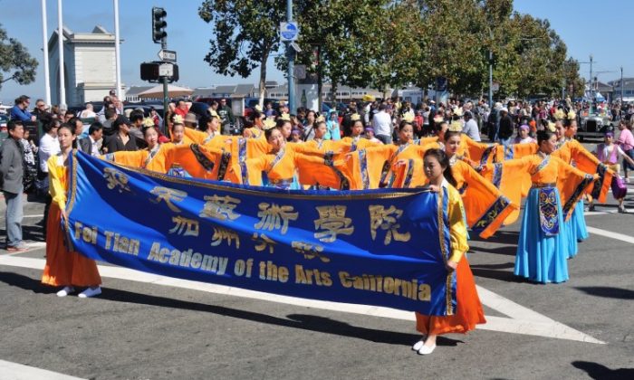 The Divine Land Marching Band passes through North Beach, San Francisco, on Oct. 7 as part of the traditional Italian Heritage Parade. (Christian Watjen/The Epoch Times)