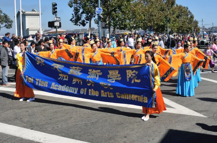 The Divine Land Marching Band passes through North Beach, San Francisco, on Oct. 7 as part of the traditional Italian Heritage Parade. (Christian Watjen/The Epoch Times)