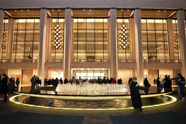 People wait around the fountain at Lincoln Center for the opening of Shen Yun on Jan 11. Updating the central fountain has saved the center $1.5 million annually. (Benjamin Chasteen/The Epoch Times)