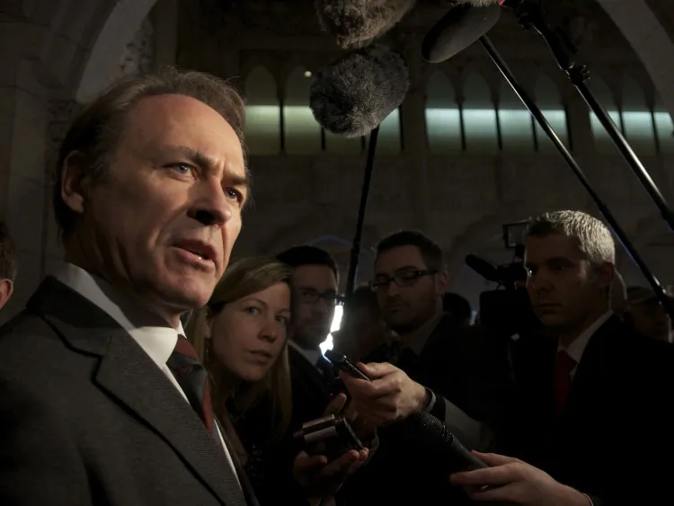 NDP House Leader Joe Comartin tabled a motion calling for all MPs to provide Elections Canada and the RCMP with all information they have on voter suppression and illegal phoning during the last election. (Matthew Little/The Epoch Times)