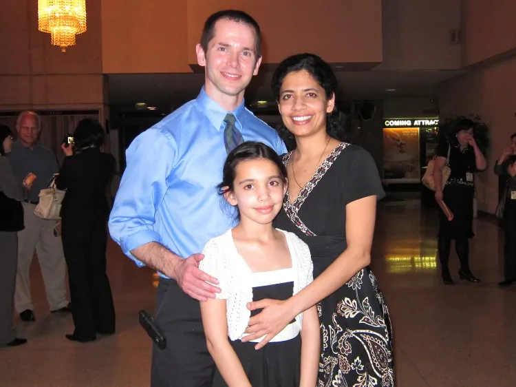 Dr. John T. Coates and his wife, Dr. Shalini-Coates, and their daughter Anjalie attend Shen Yun Performing Arts in Toledo. (Valerie Avore/The Epoch Times)