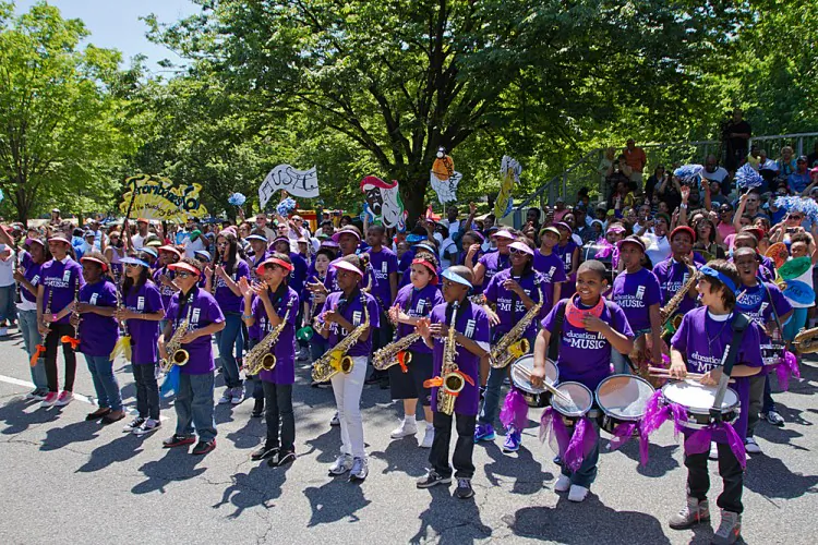 A marching band from the program Education Through Music. (Benjamin Chasteen/The Epoch Times)