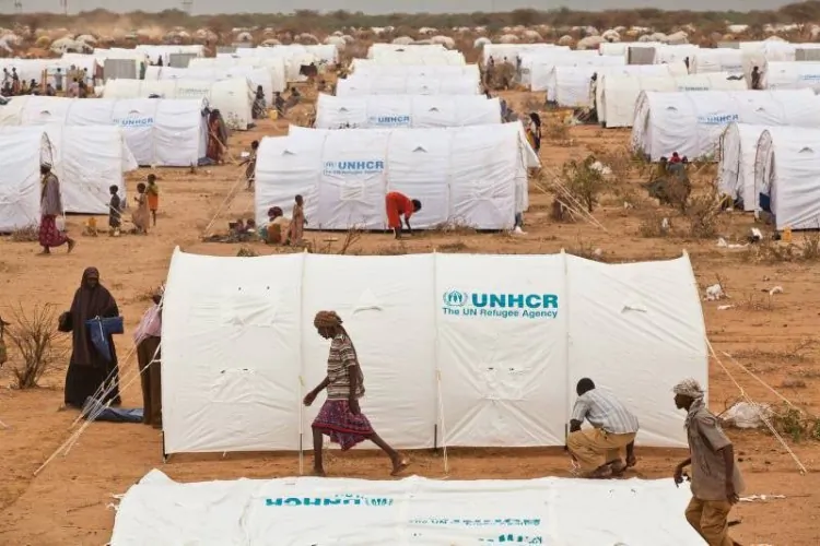 Image shows UN Refugee Agency tents at the Ifo camp, an extension of the Dadaab refugee complex in Kenya. According to the UNHCR’s Global Trends Report 2011, released to coincide with World Refugee Day on June 20, 7.1 million refugees around the world are stuck for years on end in camps or living precariously in cities. Furio De Angelis, the UNHCR’s representative in Canada, praised Canada for its tradition of accepting refugees. “Canada should be proud of its longstanding hospitable tradition of receiving and allowing hundreds of thousands of refugees from different parts of the world to re-establish their hopes in this country,” he said in a statement. Several events took place across the country to mark World Refugee Day 2012. (UNHCR/B. BANNON)