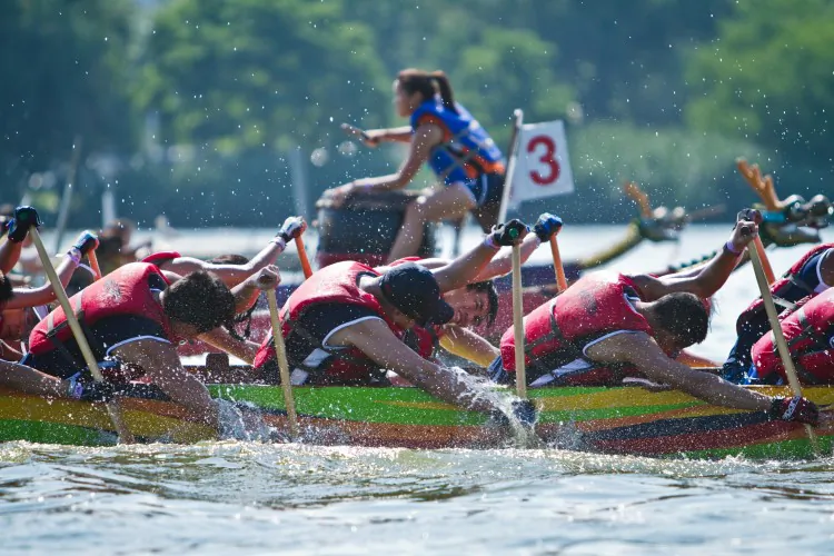 Team JP Morgan Chase competes in the 22nd annual Hong Kong Dragon Boat Festival in Flushing, Queens, Saturday.