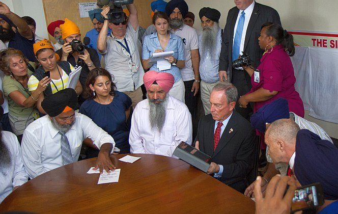 NYPD Police Commissioner Ray Kelly and New York City Mayor Michael Bloomberg offer their condolences at the Sikh temple in Richmond Hill, Queens, Monday, Aug. 6, in the wake of the Sikh Wisconsin shooting on Sunday which left six dead and three injured. (Benjamin Chasteen/The Epoch Times)