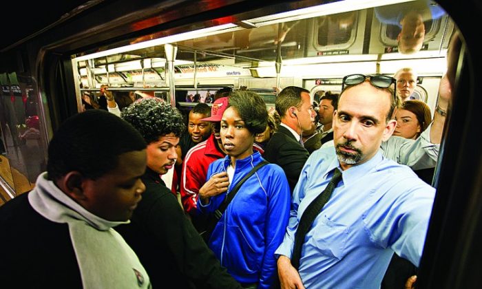 Another fare increase is on the horizon for commuters as they are crowding into a New York City subway. (Amal Chen/The Epoch Times)