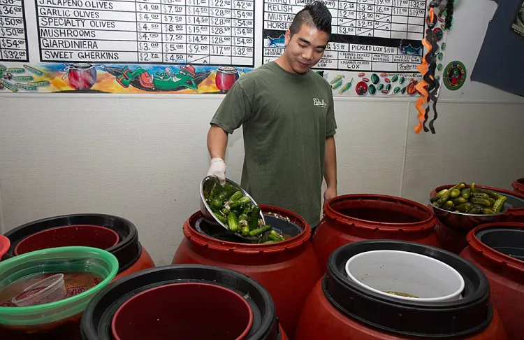 Assorted pickled fruits and vegetables for sale at The Pickle Guys store on the Lower East Side of Manhattan on Oct 24. (Benjamin Chasteen/The Epoch Times)