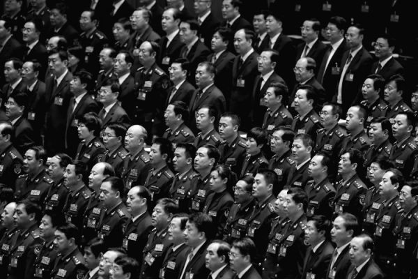 Delegates attend the opening session of the 18th Communist Party Congress held at the Great Hall of the People on Nov. 8, in Beijing, China. The Communist Party Congress will convene from Nov. 8-14 and will determine the Party's next leaders. (Feng Li/Getty Images)