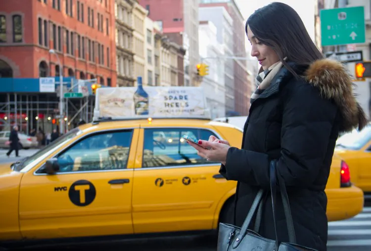 Ashwini Chhabra, deputy commissioner of the Taxi and Limousine Commission, gives a presentation to TLC commissioners and the public on Nov. 29 near City Hall, New York. (Benjamin Chasteen/The Epoch Times)