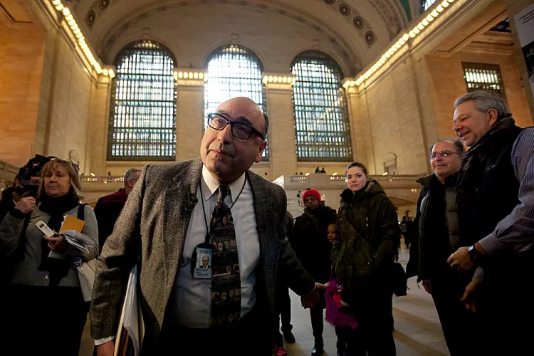 Dan Brucker talks to a tour group in front of a rotary converter in the subbasement of Grand Central Terminal on Jan. 25. (Samira Bouaou/The Epoch Times)