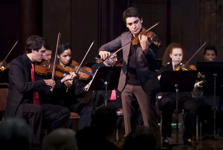 Marlon Daniel conducts the Ensemble Du Monde at the New York Society for Ethical Culture on Feb. 16. (Samira Bouaou/The Epoch Times)