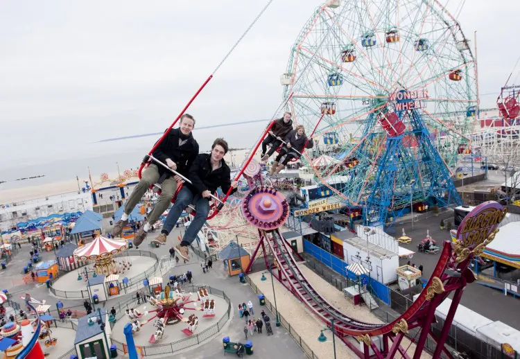 Riders enjoy one of the high thrill attractions, Air Race. (Samira Bouaou/The Epoch Times)