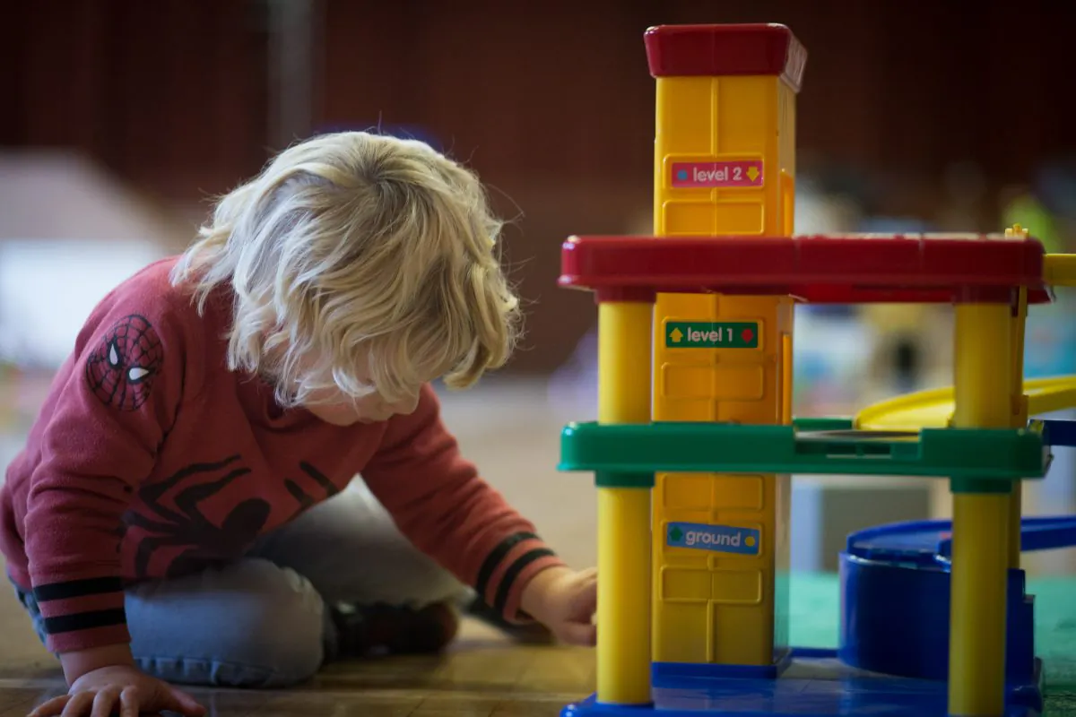 A young boy plays with toys at a preschool in this file photo. (Matt Cardy/Getty Images)