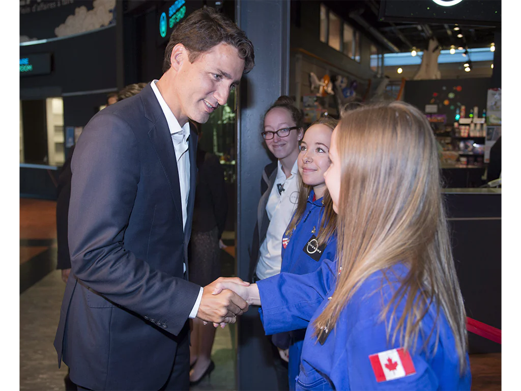 Federal Liberal Leader Justin Trudeau greets staff during a visit to the Cosmodome in Laval, Que., on July 21, 2015. (The Canadian Press/Ryan Remiorz)