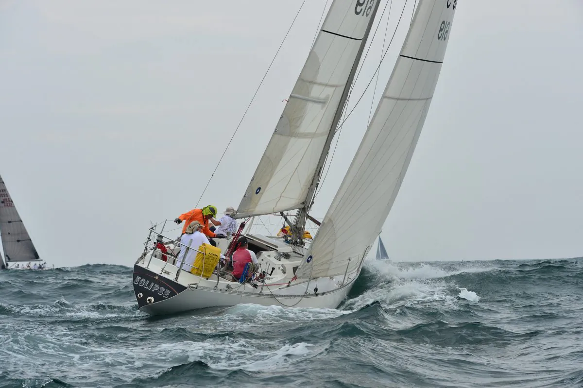 ‘Eclipse’ pushing upwind in a heavy sea during Race-6 of the Hebe Haven Quest Yachting Typhoon Series, off Trio Island on Sunday July 19, 2015. (Bill Cox/Epoch Times)
