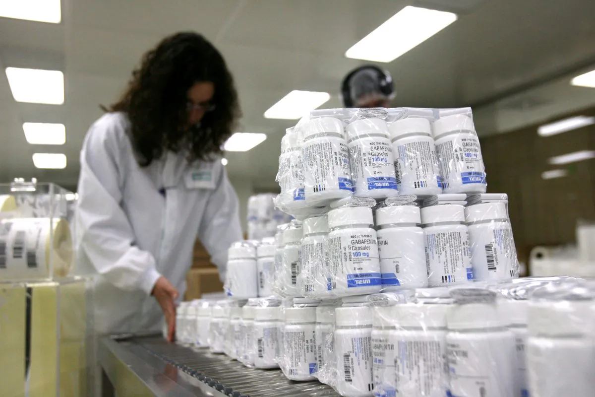 Teva Pharmaceuticals workers pack drugs in a clean room at the company's manufacturing plant in Jerusalem on March 10, 2008. (Uriel Sinai/Getty Images)