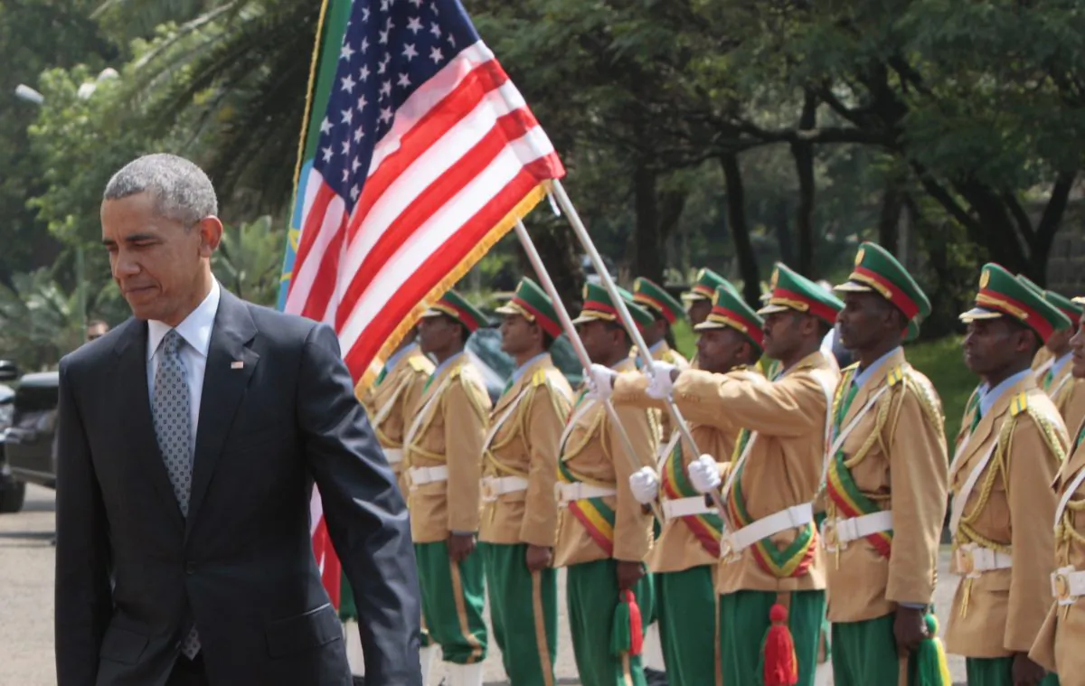 U.S. President Barack Obama, right, inspects the honor guard as he arrives to meet with Ethiopian prime minister, Hailemariam Desalegn at the National Palace in Addis Ababa , Ethiopia, Monday, July 27, 2015.  (AP Photo/Sayyid Azim)