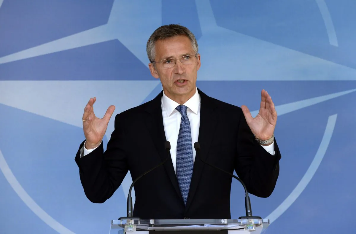 NATO Secretary General Jens Stoltenberg gestures as he speaks to the media ahead of a NATO Defence ministers' meeting at the NATO headquarter in Brussels on June 24, 2015. (Thierry Charlier/AFP/Getty Images)