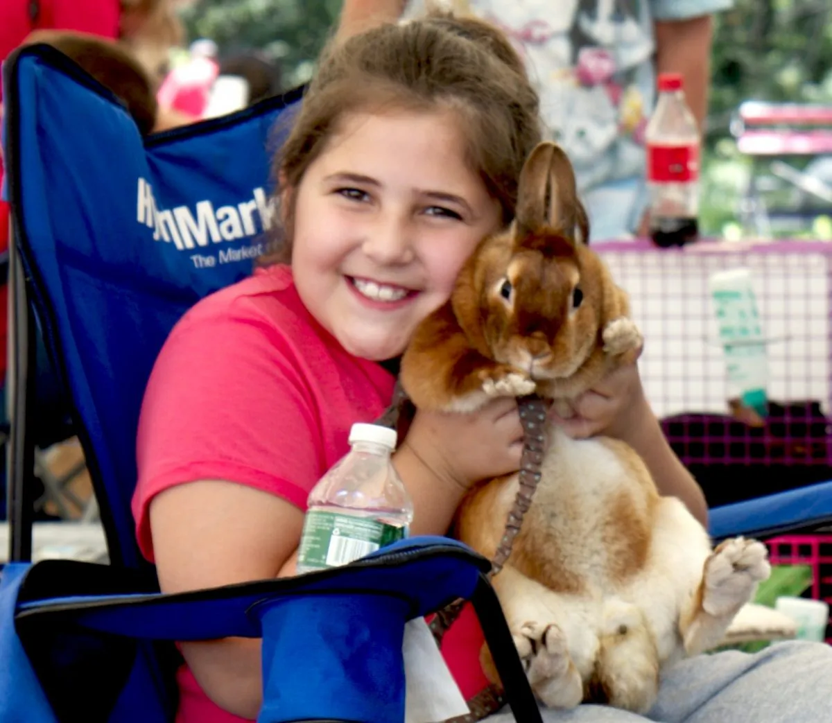 Rachael Cesarz, 8, holds her rabbit Candy at the 4-H Orange County Hare Raisers club showcase, part of the Family Fun Day at the brand new 4-H Park in Otisville, NY. (Katy Mantyk/Epoch Times)
